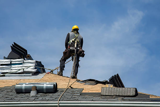 Professional Roof Replacement technician working in Crabtree, OR